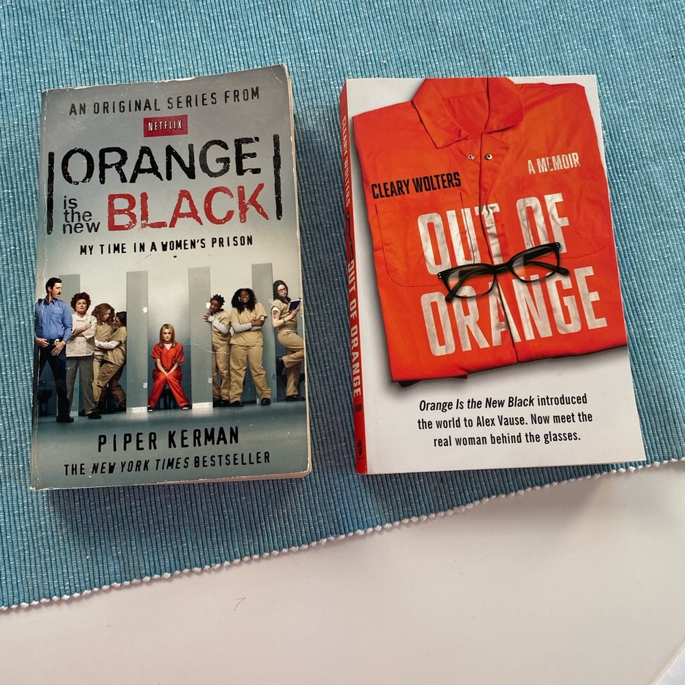 Paperback books. Orange is the new Black & the follow up, Out of the Orange.